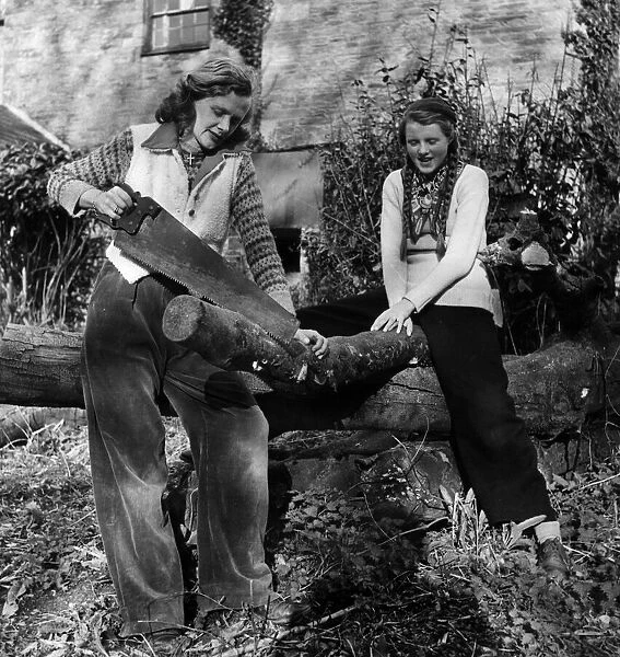 Daphne du Maurier and her daughter Tessa. 'Sawing wood