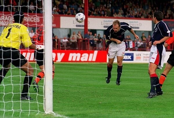 Dariusz Adamczuk Sept 1998 heads the equaliser for Dundee