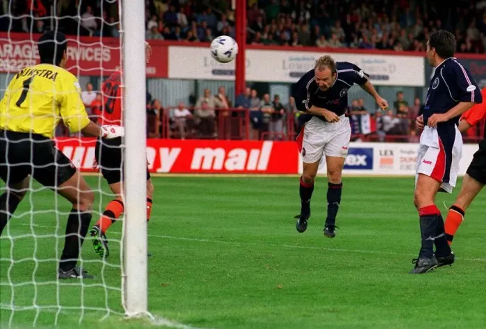 Framed Print : Dariusz Adamczuk Sept 1998 heads the equaliser for Dundee Framed Print : Dariusz Adamczuk Sept 1998 heads the equaliser for Dundee