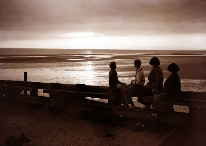 Framed Print : Darkness falls around them as they watch the sunset at Rye Bay Sussex June 1935 Framed Print : Darkness falls around them as they watch the sunset at Rye Bay Sussex June 1935