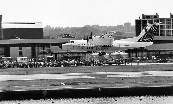 Dash 7 Aircraft lands at Londons Dockland Airport. June 1987 P004355