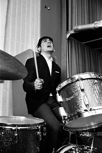 Dave Clark, leader and drummer of the English pop rock group