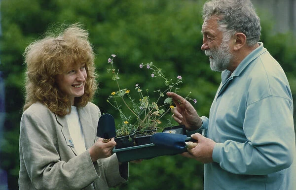 David Bellamy and Diane Crozier, of English Nature, plant wild flowers to represent