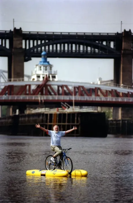Framed Print : David Bellamy tries out the shuttle bike to cross the River Tyne in Newcastle on 11th May
