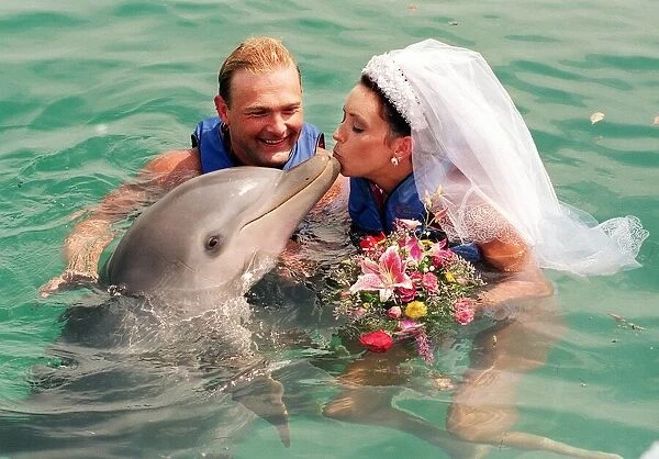 David Blades dolphin wedding Bahamas 1998 marries bride Avril Thomson in Blue