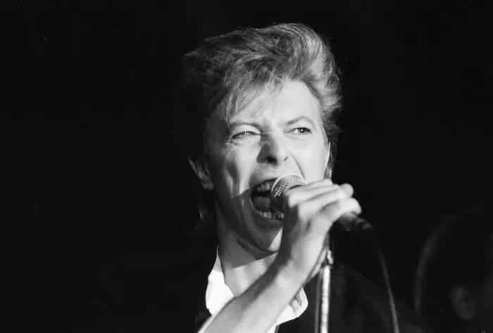 Framed Print : David Bowie seen here singing at the press conference to announce the details of his Framed Print : David Bowie seen here singing at the press conference to announce the details of his