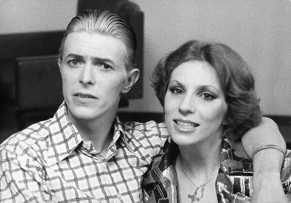 David Bowie seen here with his wife Angie during a visit to London in 4th May 1976