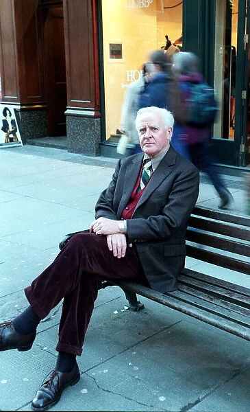 David Cornwall Author March 1999 Sitting on bench in Buchanan Street Glasgow Legs