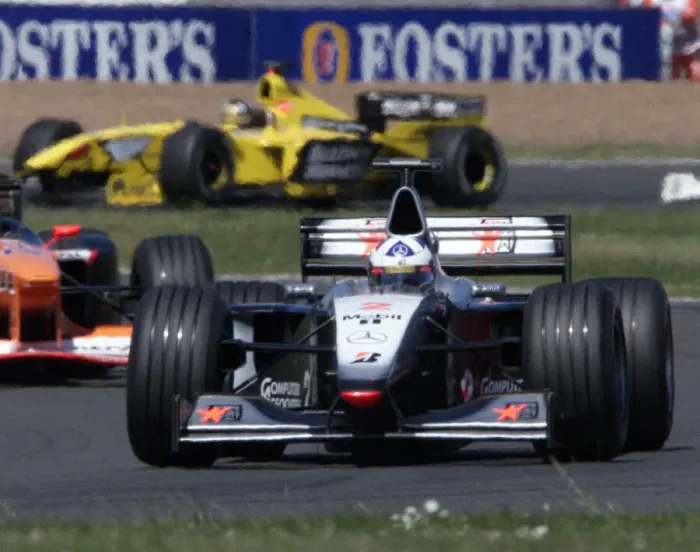 Framed Print : David Coulthard leading the British Grand Prix July1999 with David Coulthard in Framed Print : David Coulthard leading the British Grand Prix July1999 with David Coulthard in