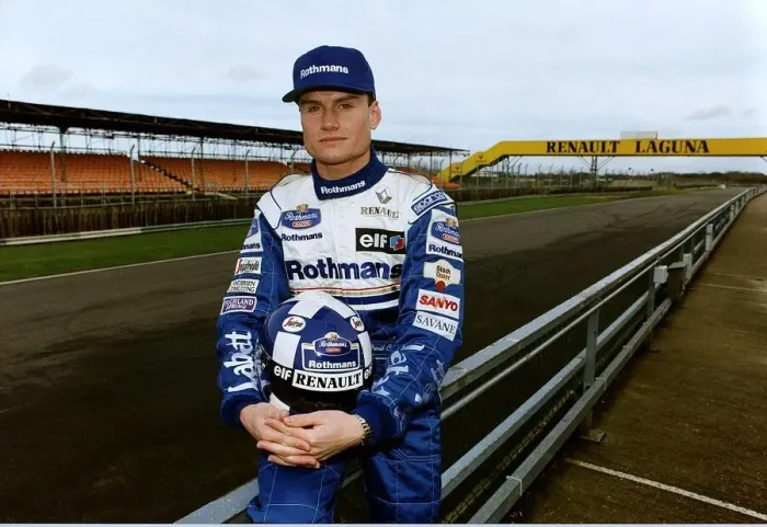 Framed Print : David Coulthard sitting on fence at race track holding helmet Formula One racing Framed Print : David Coulthard sitting on fence at race track holding helmet Formula One racing