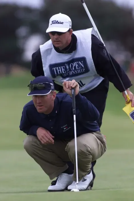 Framed Print : David Duval lines up a putt with his caddie July 1999 on the 11th green during Framed Print : David Duval lines up a putt with his caddie July 1999 on the 11th green during