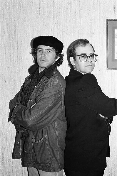 David Essex and Elton John. The two soccer mad fans have just watched their lads do