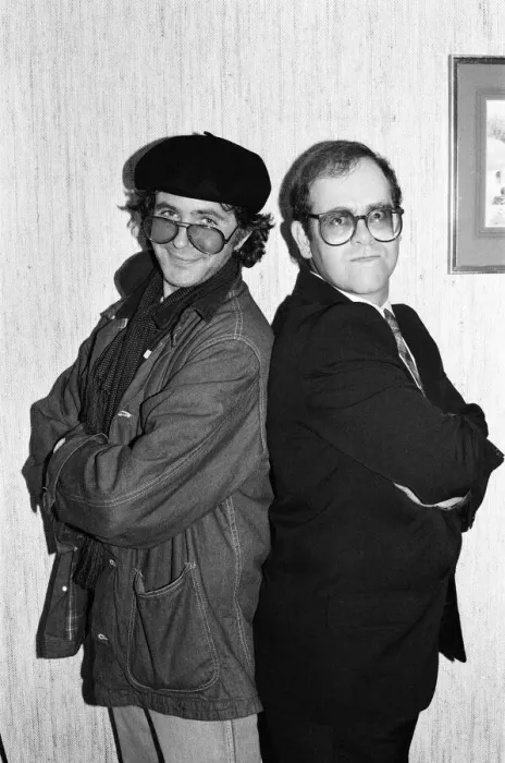 Framed Print : David Essex and Elton John. The two soccer mad fans have just watched their lads do Framed Print : David Essex and Elton John. The two soccer mad fans have just watched their lads do