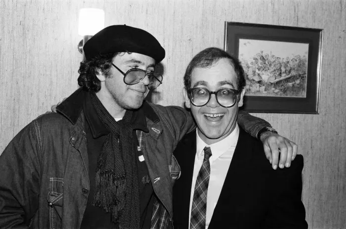 Framed Print : David Essex and Elton John. The two soccer mad fans have just watched their lads do Framed Print : David Essex and Elton John. The two soccer mad fans have just watched their lads do
