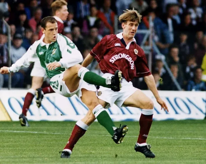 Framed Print : David Farrel beats Gary Mackay in a midfield tussle Hearts versus Hibernian football