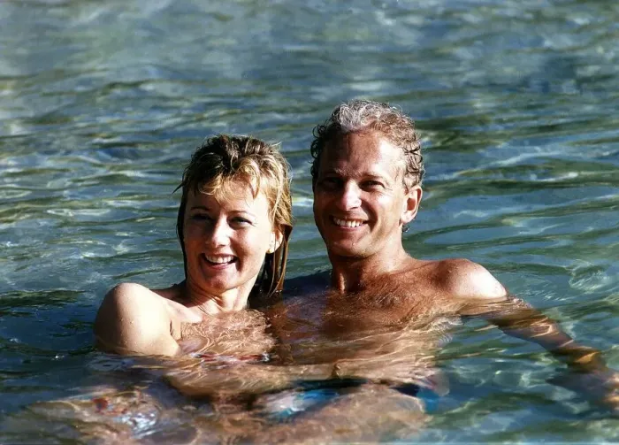 Framed Print : David Gower cricketer with Thorrun Nash in the sea during their visit to the West Indies Framed Print : David Gower cricketer with Thorrun Nash in the sea during their visit to the West Indies