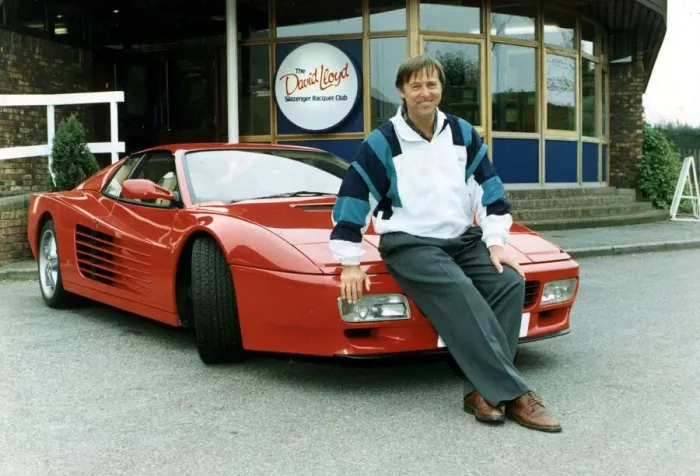 Framed Print : DAVID LLOYD AT THE DAVID LLOYD RACQUET CENTRE SITTING ON THE BONNET OF A RED FERRARI Framed Print : DAVID LLOYD AT THE DAVID LLOYD RACQUET CENTRE SITTING ON THE BONNET OF A RED FERRARI