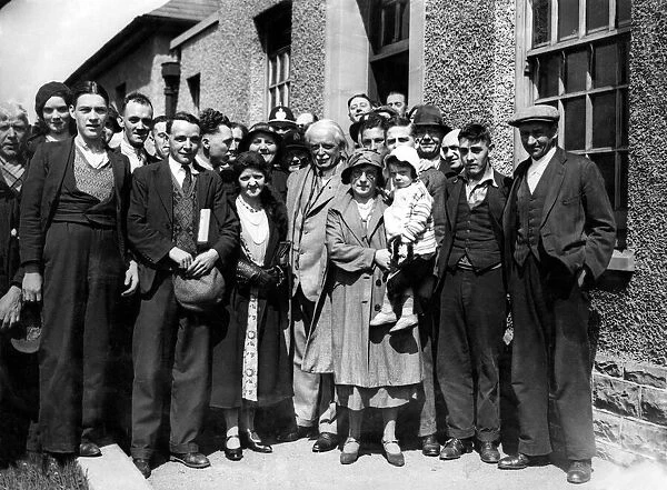 David Lloyd George pictured with a local community. Circa 1934