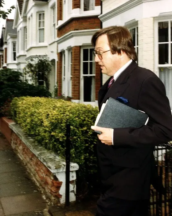 Framed Print : David Mellor Conservative MP looks worried as he leaves his Putney home Framed Print : David Mellor Conservative MP looks worried as he leaves his Putney home