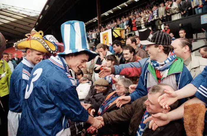 Framed Print : David Robertson Rangers football player with Ian Durrant both wearing hats greet the fans Framed Print : David Robertson Rangers football player with Ian Durrant both wearing hats greet the fans