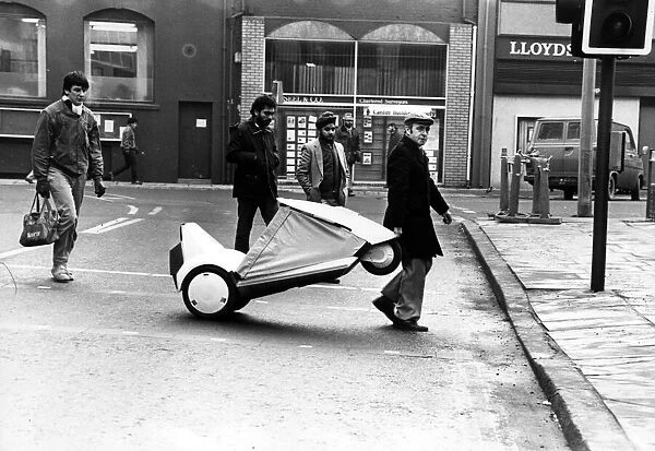 David out and about on his Sinclair C5 in Cardiff. Crossing the road is no problem