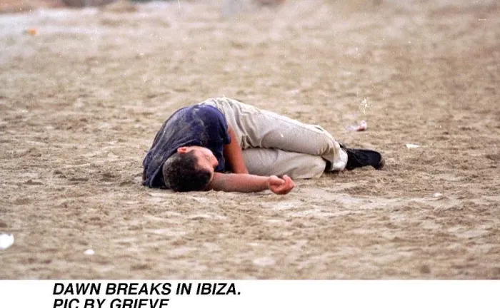 Framed Print : Dawn breaks in Ibiza Spain Drink Drunk youth Young man sleeps it off on the beach Framed Print : Dawn breaks in Ibiza Spain Drink Drunk youth Young man sleeps it off on the beach