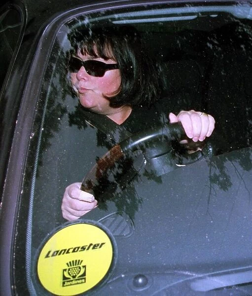 Dawn French leaves her home in Shinfield Berkshire after allegations of husband Lenny