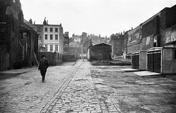 A Day in the Life of Shepherds Market, circa 1948. A bombsite behind Shepherds