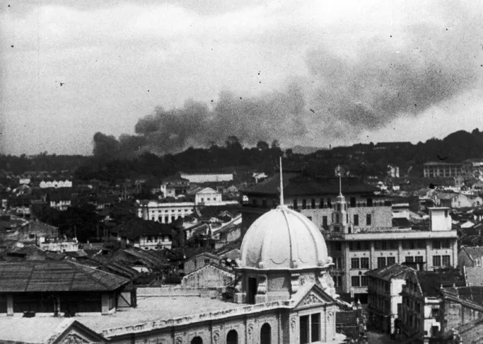 Framed Print : Last days of Singapore. A picture showing smoke rising over Singapore during a Japanese Framed Print : Last days of Singapore. A picture showing smoke rising over Singapore during a Japanese