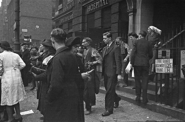 Dazed patients outside the Central London Ophthalmic Hospital Grays Inn Road