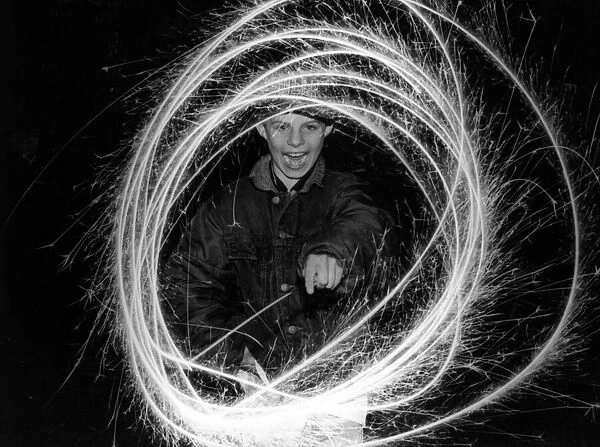Dean Lokko of Rhyl has fun with sparklers on Bonfire night. 11th November 1993