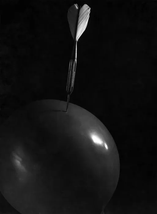 Framed Print : Death of a balloon. A dart about to puncture the surface 1947 P004778 Framed Print : Death of a balloon. A dart about to puncture the surface 1947 P004778