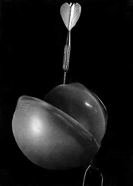 Death of a Balloon: It opens out, nearing its end, the sharp point neatly paring it