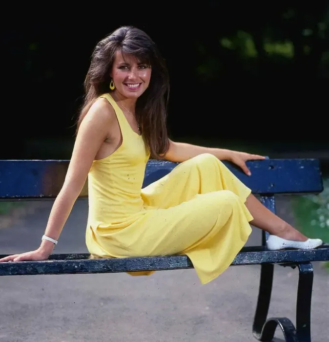 Framed Print : Debbie Greenwood TV presenter July 1987 sitting o a bench wearing a yellow dress Framed Print : Debbie Greenwood TV presenter July 1987 sitting o a bench wearing a yellow dress