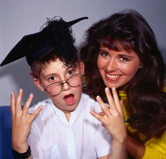 Framed Print : Debbie Greenwood TV presenter September 1986 with schoolboy Paul Cherry
