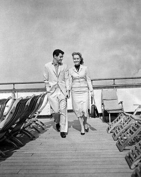 Debbie Reynolds and Eddie Fisher photographed aboard the Queen Elizabeth when she arrived