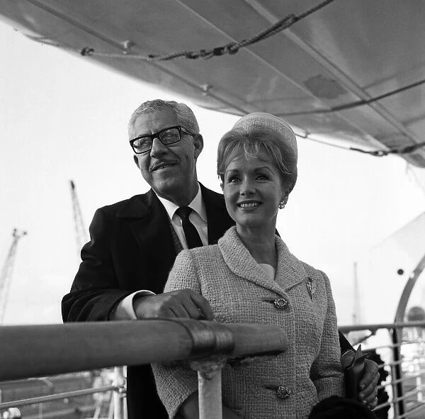 Debbie Reynolds and her husband Harry Karl arriving in England on board the Queen