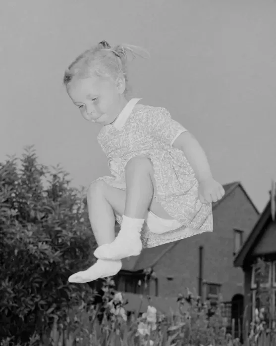 Framed Print : Deborah Blake seen here bouncing gaily on a trampoline in the garden of her family home Framed Print : Deborah Blake seen here bouncing gaily on a trampoline in the garden of her family home
