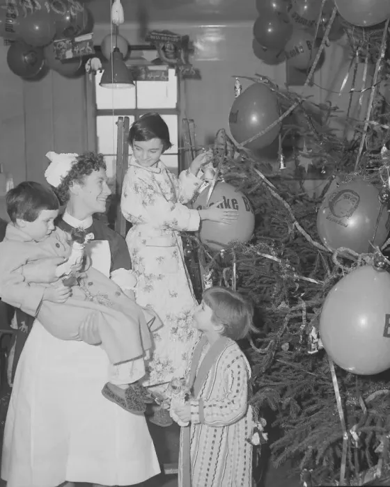 Framed Print : Decorating the Christmas tree is a perogative of the ward sister Framed Print : Decorating the Christmas tree is a perogative of the ward sister