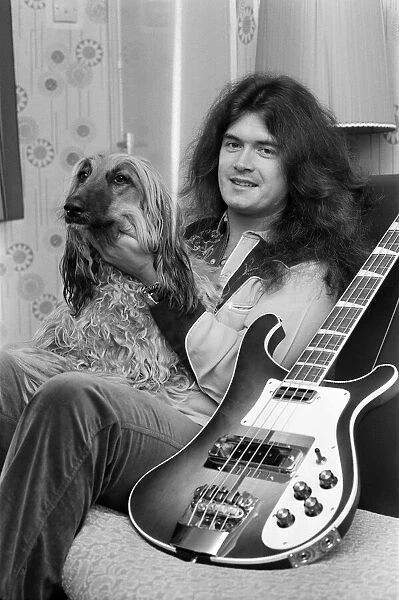 Deep Purple guitarist Glenn Hughes relaxes with his pet Afghan hound Khama after