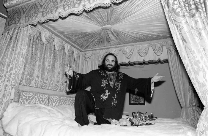 Framed Print : Demis Roussos November 1977 Perched on his mink covered bed which cost 30 Framed Print : Demis Roussos November 1977 Perched on his mink covered bed which cost 30