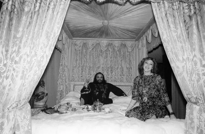 Framed Print : Demis Roussos November 1977 Perched on his mink covered bed which cost 30 Framed Print : Demis Roussos November 1977 Perched on his mink covered bed which cost 30