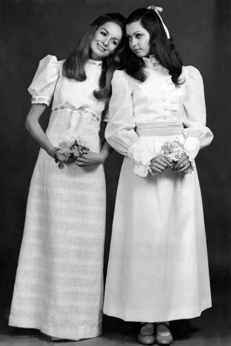 Framed Print : Demure in white. At left, white broderie anglaise trimmed with yellow ribbons by Framed Print : Demure in white. At left, white broderie anglaise trimmed with yellow ribbons by