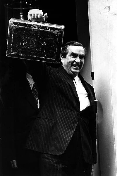 Denis Healey, Chancellor of the Exchequer, leaving 11 Downing Street holding the budget