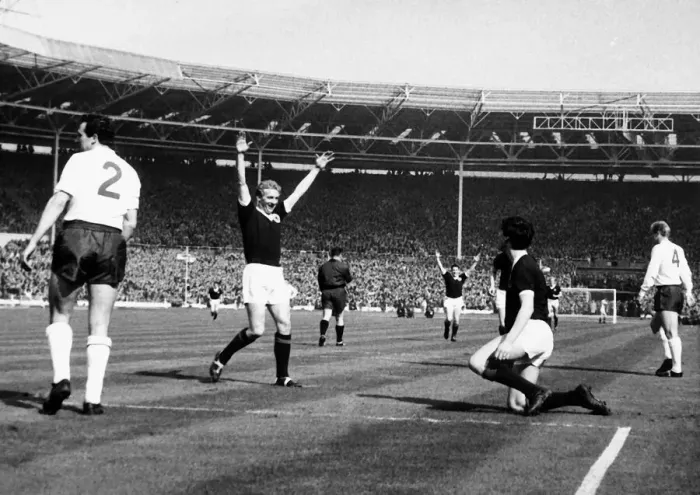 Framed Print : Denis Law celebrating Jim Baxter goal against England April 1963 Framed Print : Denis Law celebrating Jim Baxter goal against England April 1963