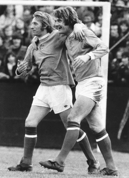 Framed Print : Denis Law congratulates Rodney Marsh January 1974 after scoring goal for Manchester Framed Print : Denis Law congratulates Rodney Marsh January 1974 after scoring goal for Manchester