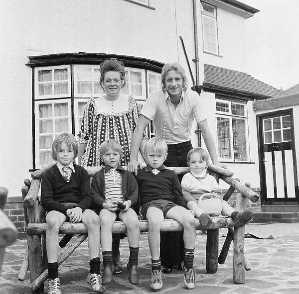 Denis Law, Manchester City football player, pictured at home with family in Bowden