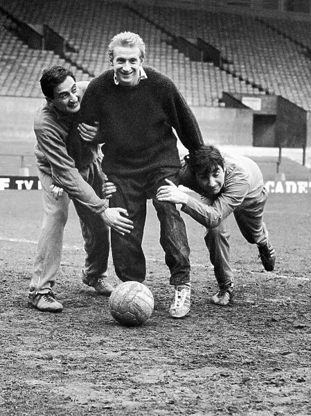 Denis Law of Manchester United training at Old Trafford with comedy double act Mike
