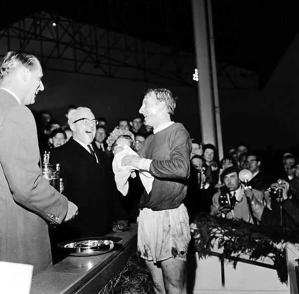 Denis Law meets Prince Philip, Duke of Edinburgh at the local football derby charity game