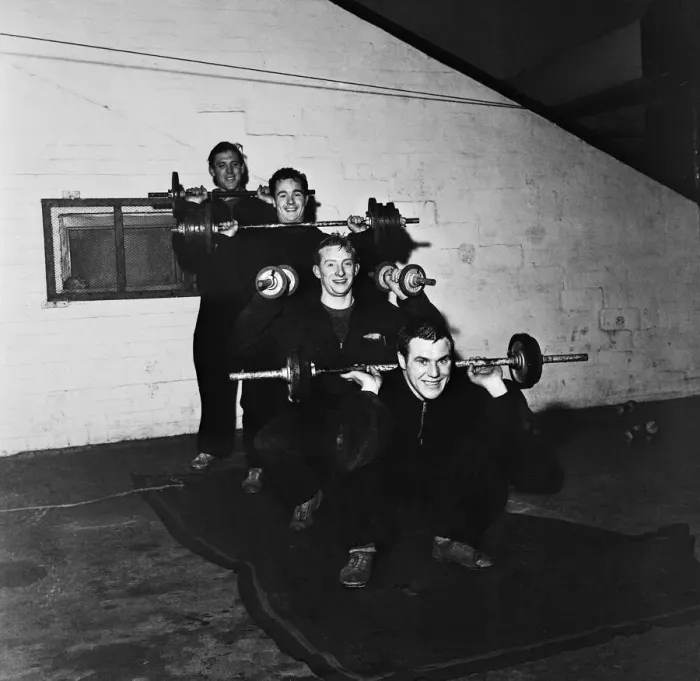 Framed Print : Denis Law training with his Huddersfield teammates before their upcoming FA Cup tie